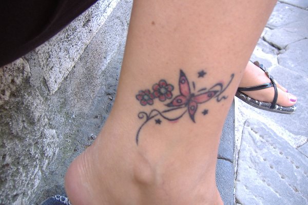 Cristina - Butterfly flowers tattoo
