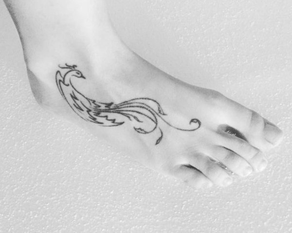 Guest - Rebirth of a phoenix tattoo