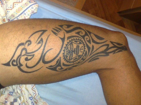 Luca - Manaia sun and lizard tattoo photo